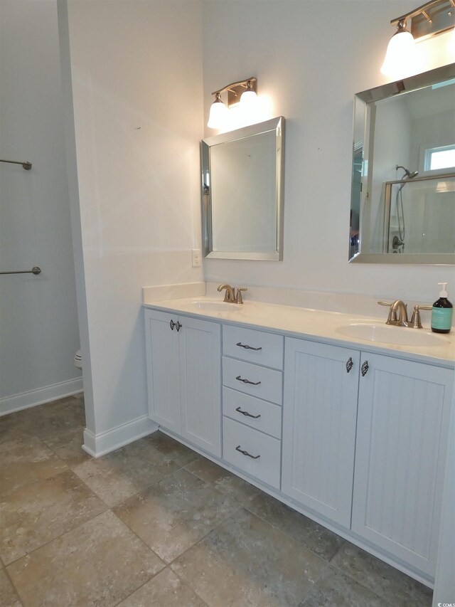 64 Summerlight Dr, Murrells Inlet, SC 29576 - bathroom featuring a shower, toilet, double vanity, and a sink