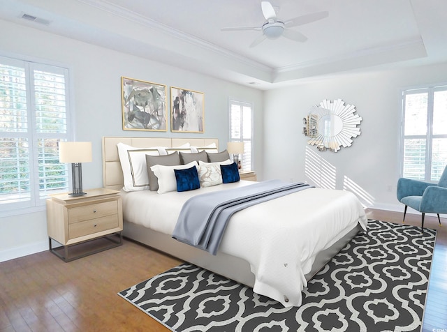64 Summerlight Dr, Murrells Inlet, SC 29576 - bedroom with hardwood / wood-style flooring, crown molding, multiple windows, and a raised ceiling