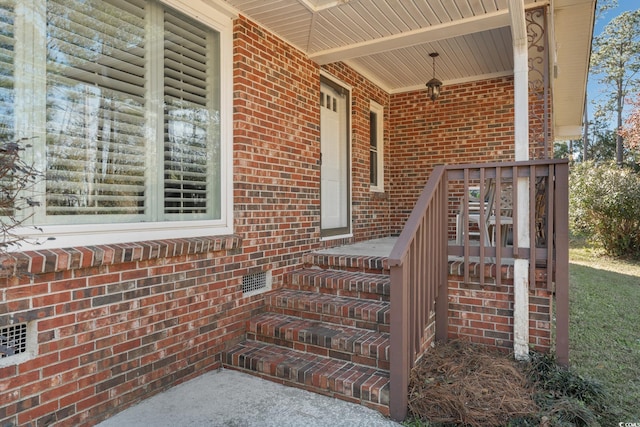 property entrance featuring covered porch