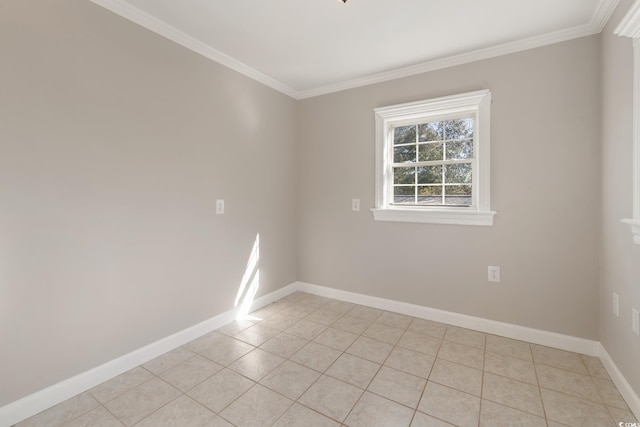 tiled empty room featuring ornamental molding