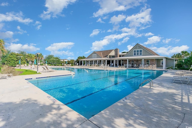 view of pool featuring a patio