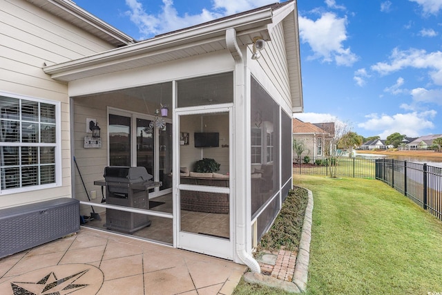 exterior space featuring a lawn and a patio area