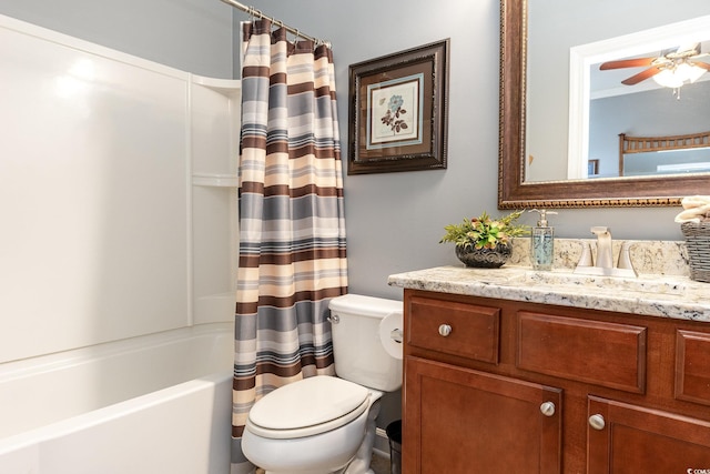 full bathroom featuring vanity, ceiling fan, shower / bathtub combination with curtain, and toilet