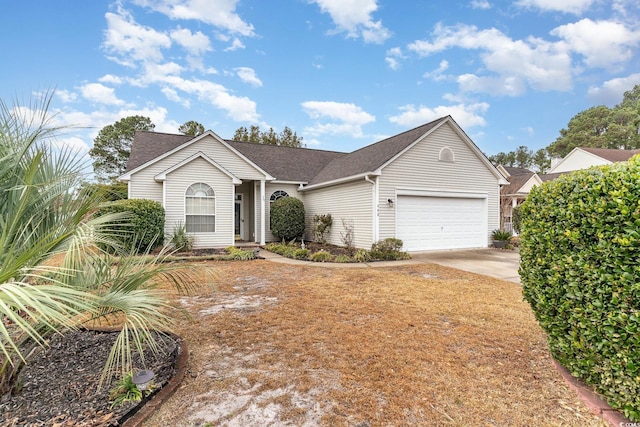 ranch-style home featuring a garage