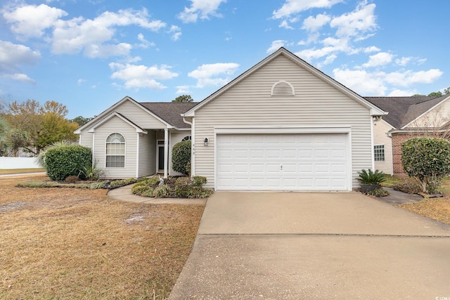 single story home featuring a garage