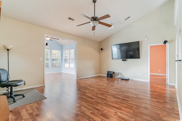 living room with ceiling fan, high vaulted ceiling, and wood-type flooring