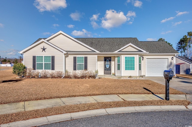 ranch-style house featuring a garage