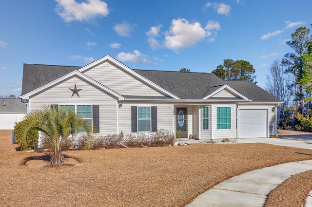 single story home with a front lawn and a garage