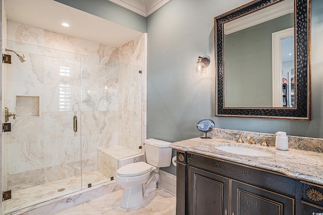 bathroom with crown molding, vanity, an enclosed shower, and toilet