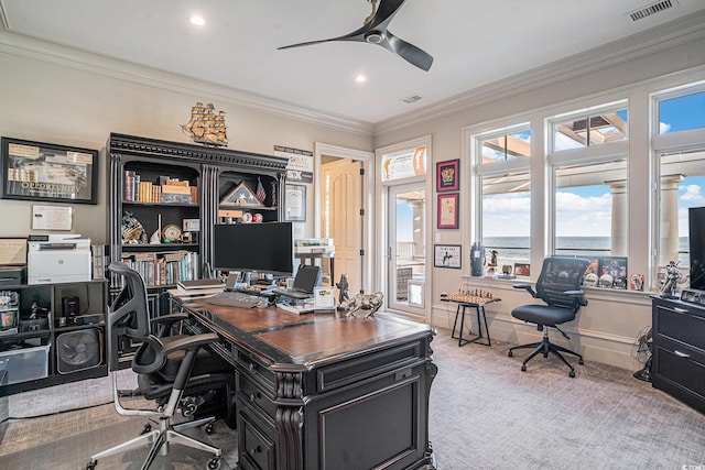 office space featuring ceiling fan, light colored carpet, and ornamental molding