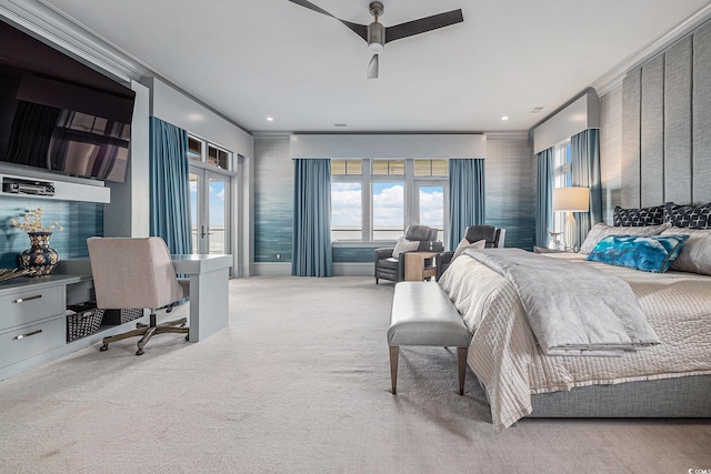 carpeted bedroom featuring ceiling fan, crown molding, and french doors