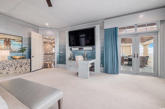 living room featuring carpet, french doors, and ceiling fan