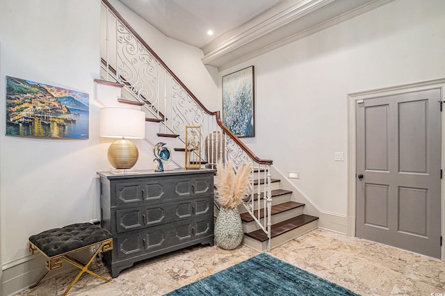 stairs featuring ornamental molding