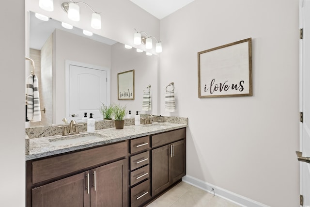 3126 White Jasmine Dr, Little River, SC 29566 - bathroom with double vanity and tile patterned floors