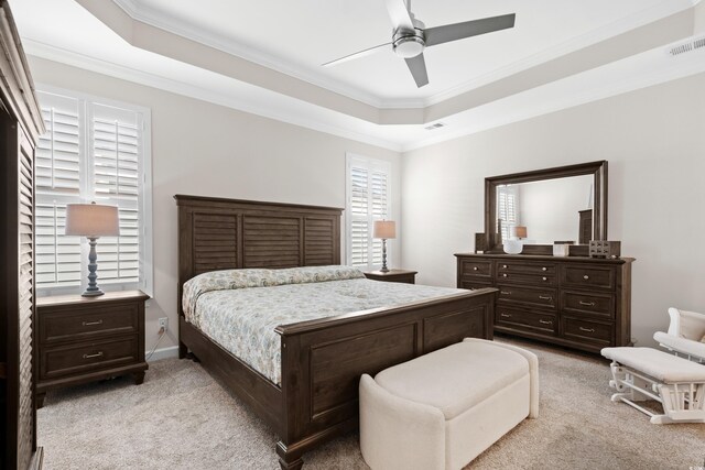 3126 White Jasmine Dr, Little River, SC 29566 - bedroom featuring a tray ceiling, light carpet, ornamental molding, and a ceiling fan