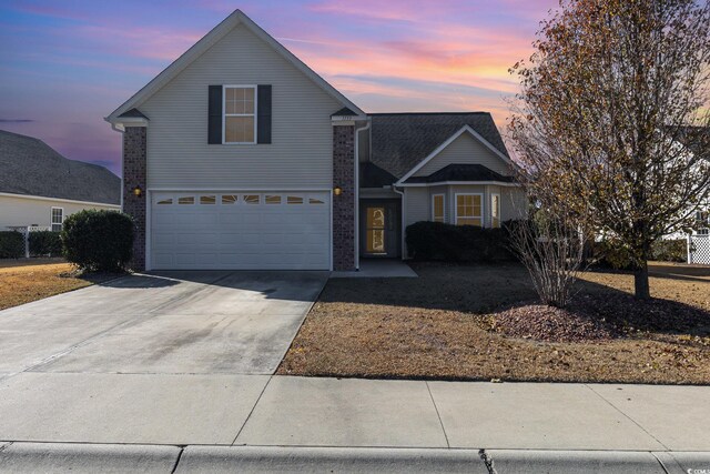 view of front property with a garage