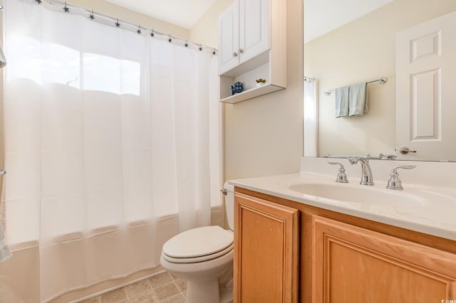 full bathroom with toilet, vanity, and shower / bath combo with shower curtain
