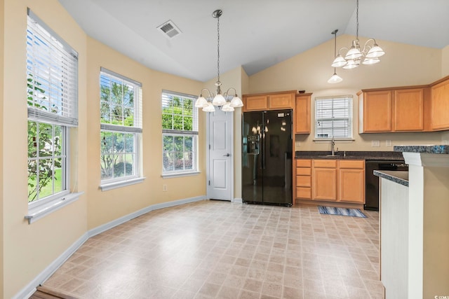 kitchen with black refrigerator with ice dispenser, a chandelier, dishwasher, a sink, and lofted ceiling