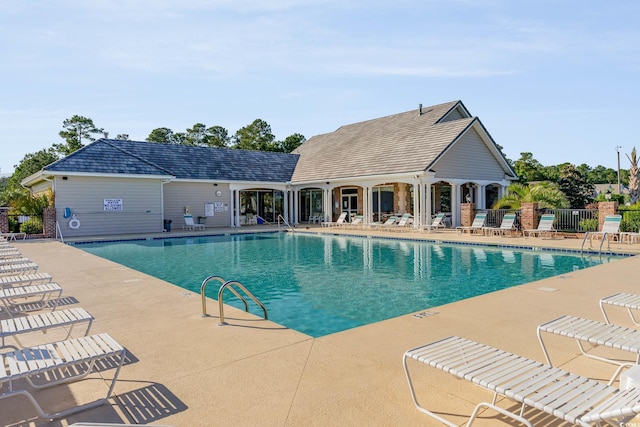 community pool featuring a patio area