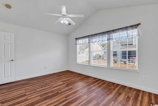 unfurnished room with hardwood / wood-style floors, vaulted ceiling, and ceiling fan