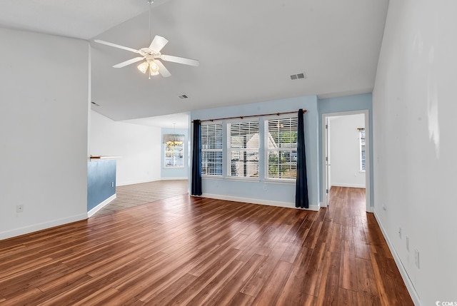 unfurnished living room featuring ceiling fan, hardwood / wood-style floors, and vaulted ceiling