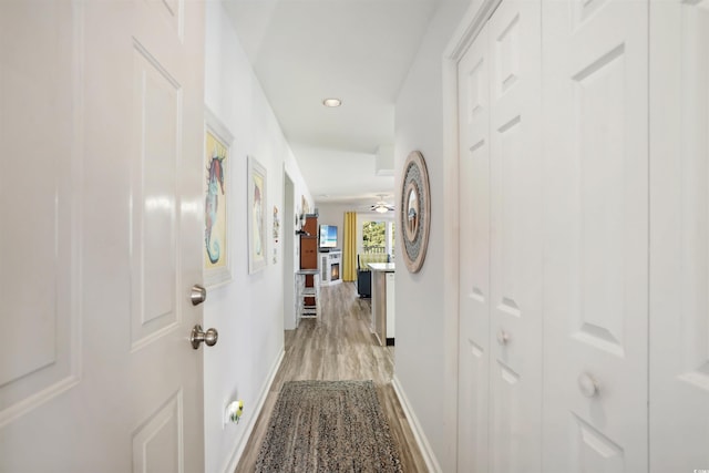 hallway featuring light hardwood / wood-style floors