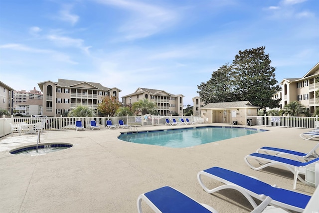 view of swimming pool featuring a patio area