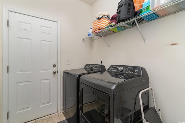 laundry room featuring washing machine and dryer