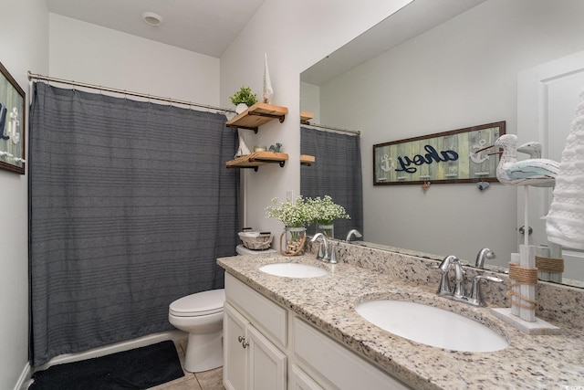 bathroom with tile patterned floors, vanity, a shower with shower curtain, and toilet