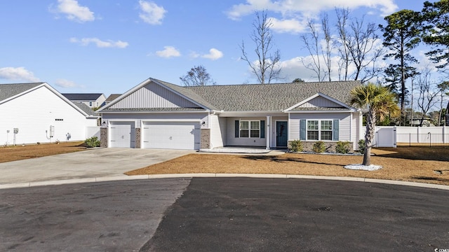 ranch-style house featuring a garage