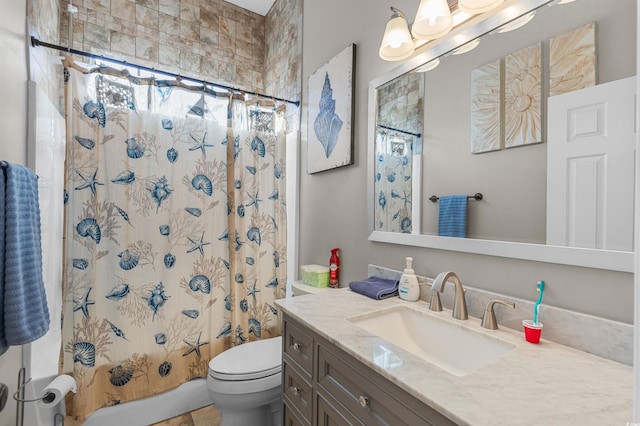 full bathroom featuring tile patterned floors, vanity, shower / bathtub combination with curtain, and toilet