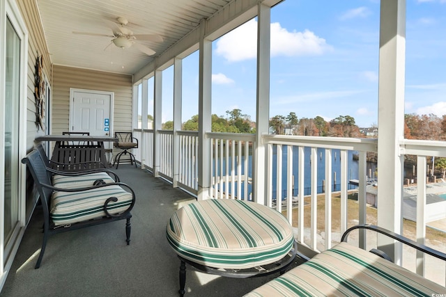 sunroom / solarium with ceiling fan