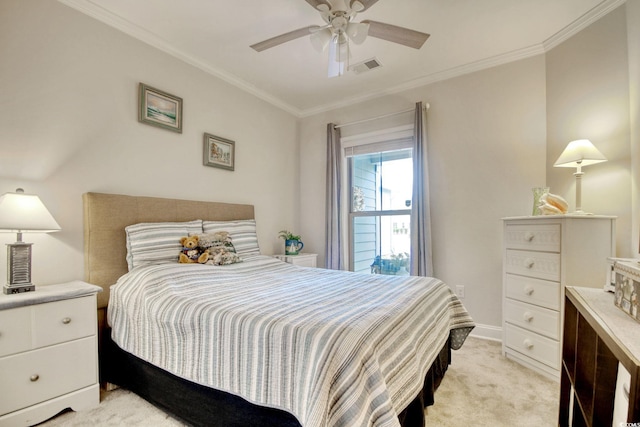 carpeted bedroom with ceiling fan and crown molding