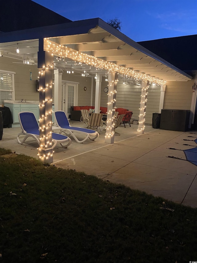 view of patio / terrace with an outdoor living space and french doors