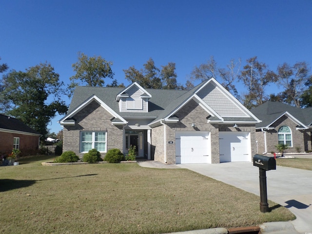 craftsman house featuring a garage and a front lawn