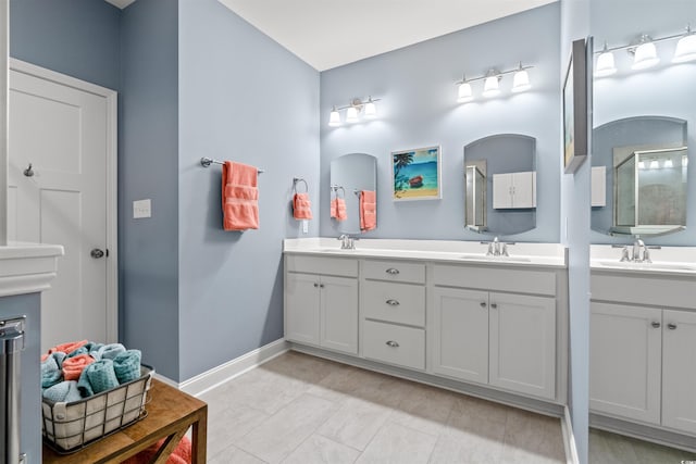 bathroom with vanity and tile patterned floors