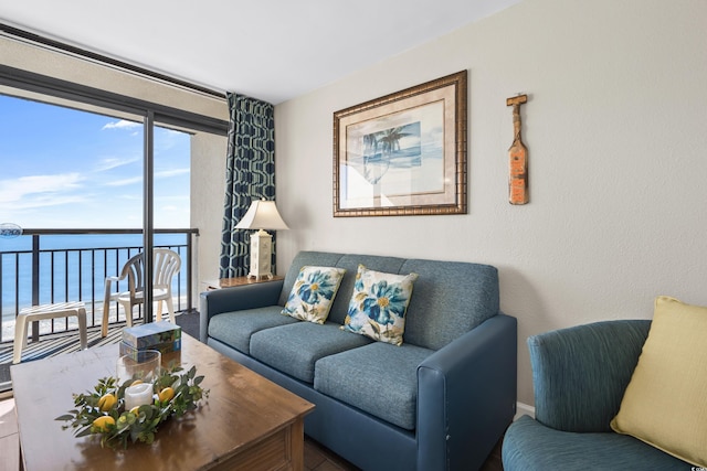 living room featuring a water view