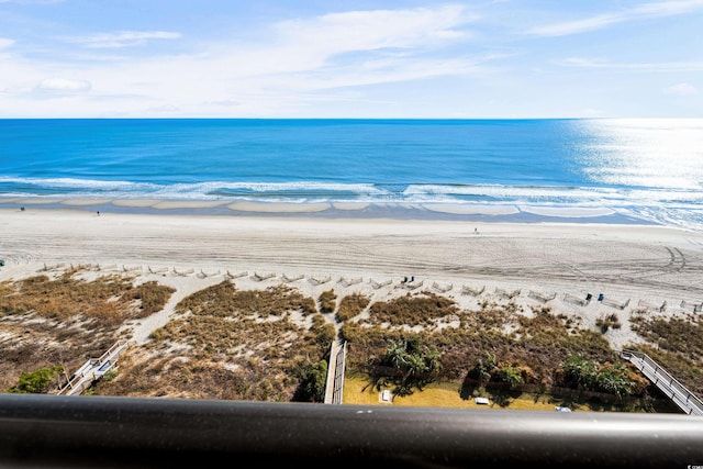 view of water feature with a beach view