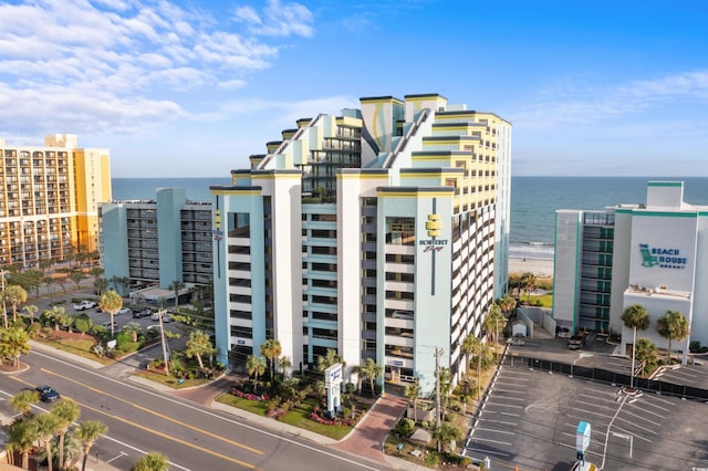 view of building exterior with a water view