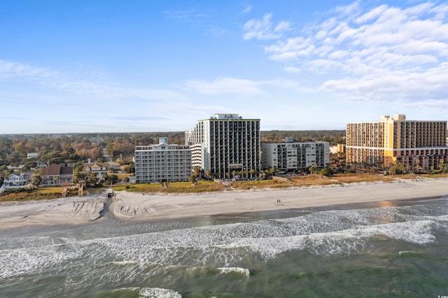 aerial view featuring a view of the beach and a water view