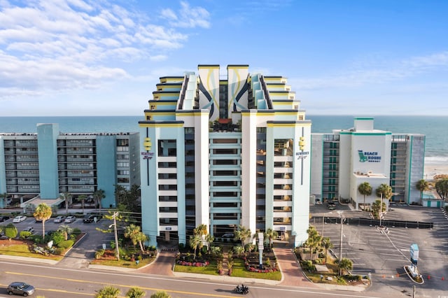 view of building exterior with a water view