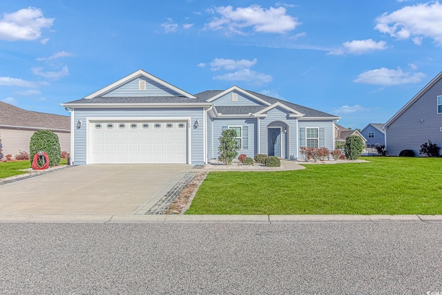 ranch-style home featuring a front yard and a garage