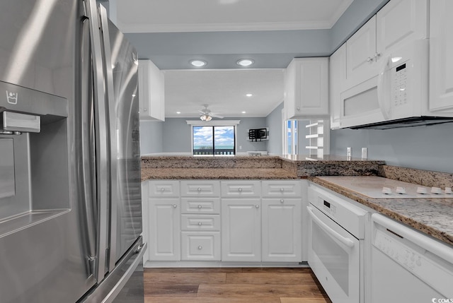 kitchen featuring stone counters, ceiling fan, white appliances, white cabinets, and hardwood / wood-style flooring