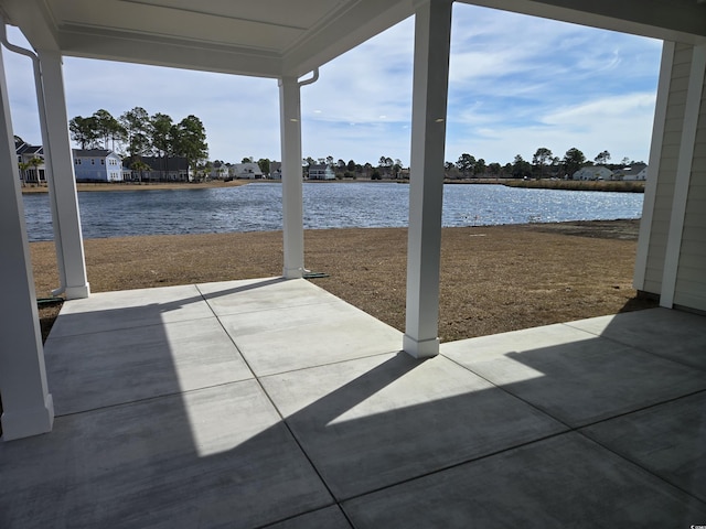 view of patio / terrace with a water view