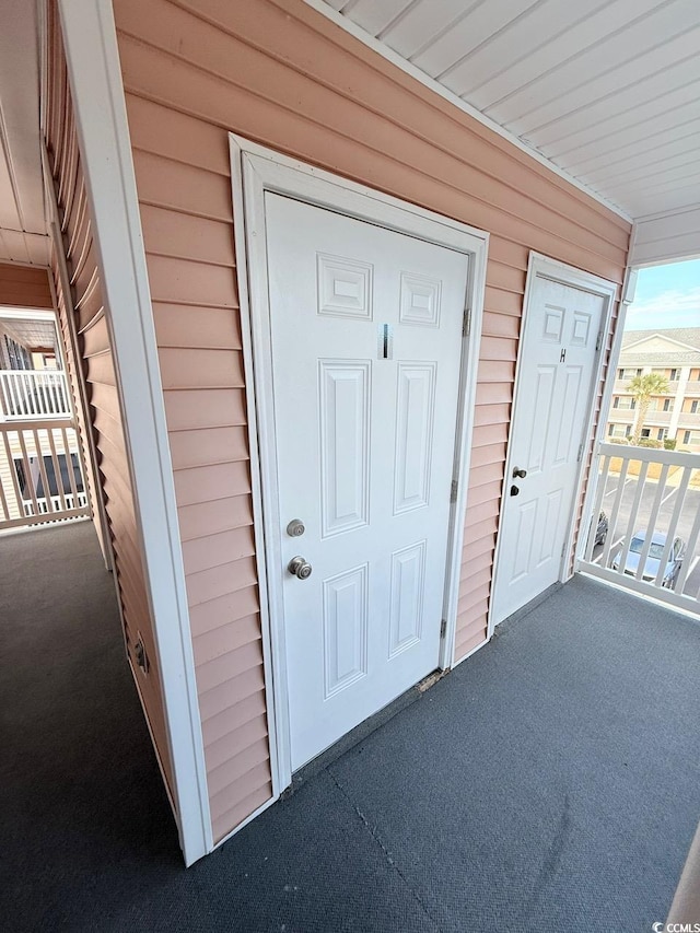 entrance to property with a porch