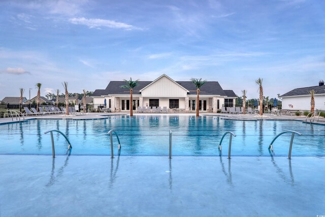 view of pool featuring a patio area