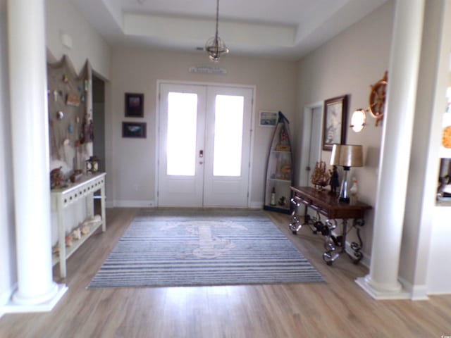 3070 Sutherland Dr, Little River, SC 29566 - foyer featuring decorative columns, french doors, and light wood finished floors