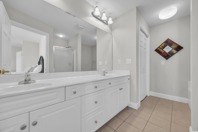 bathroom with plus walk in shower, vanity, and tile patterned floors