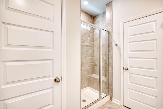 bathroom featuring walk in shower