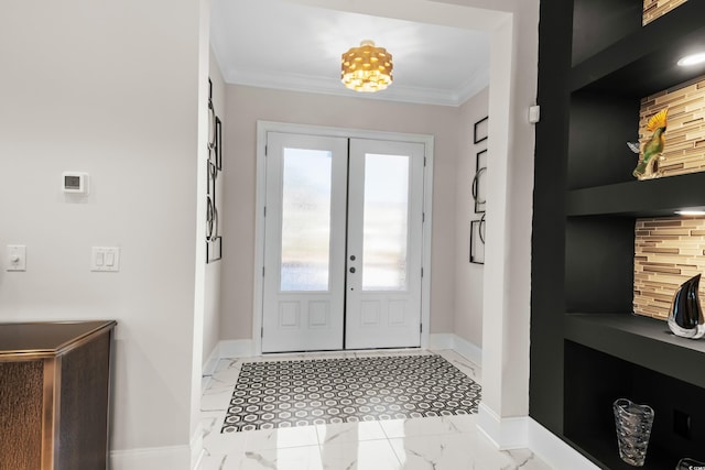 foyer entrance with french doors and crown molding